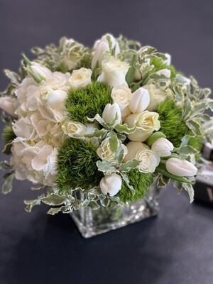 White and green flower design in a vase White and green flower design in a vase