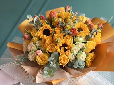 HAND-CRAFTED EUROPEAN BOUQUET WITH ROSES, SUNFLOWERS AND TULIPS