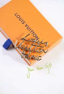 LV Brooch