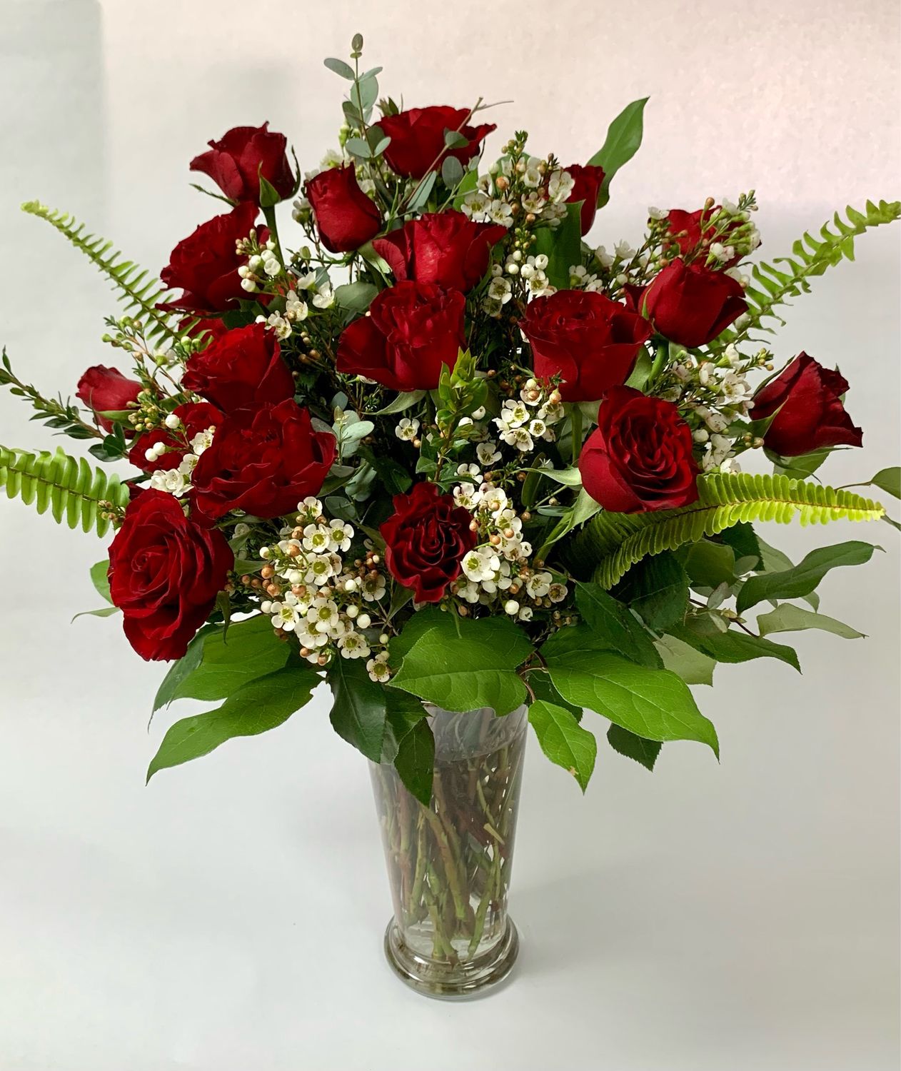 $190 - 2 Dozen Fresh Roses Arranged in a Vase with Filler - Choose Color
