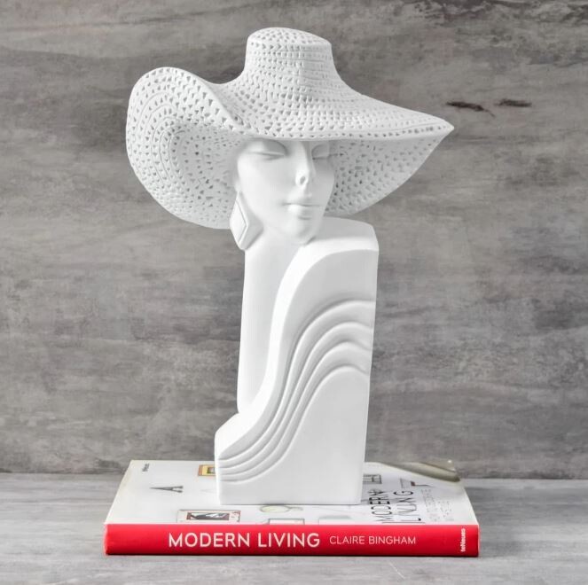 Dakota with a Hat Sculpture