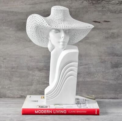Dakota with a Hat Sculpture