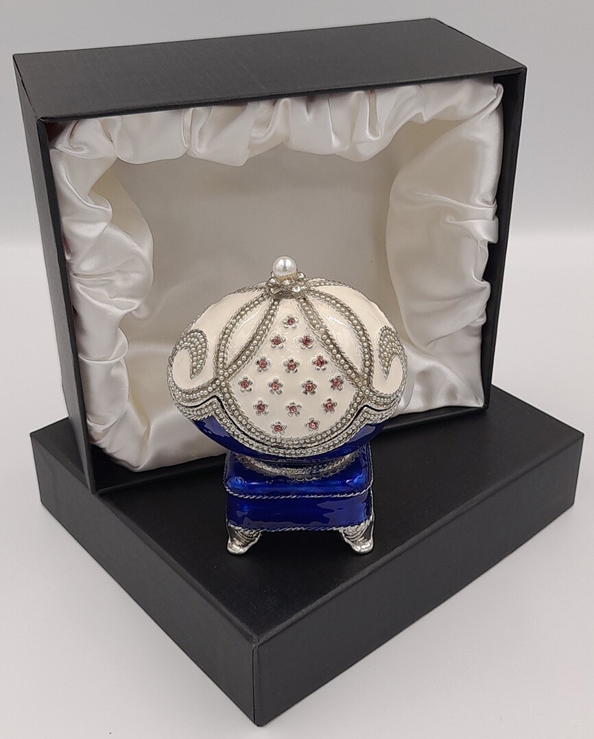 Large decorative egg on cushion  trinket box