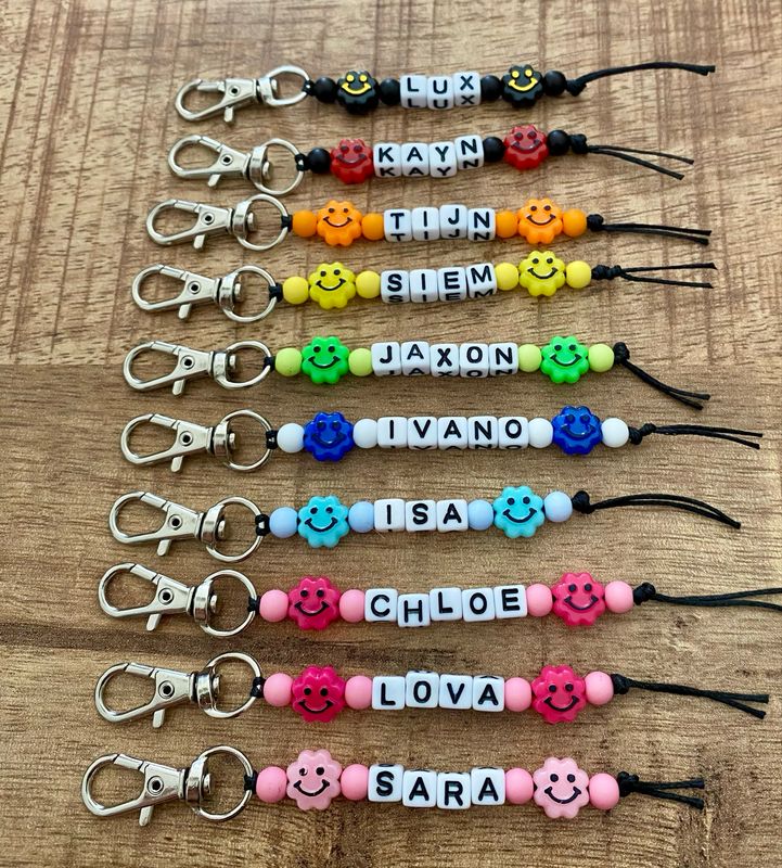 Naamsleutelhanger Smiley Bloem Los Of Als Traktatie Met Fruit Sleutels Vegan Glutenvrij