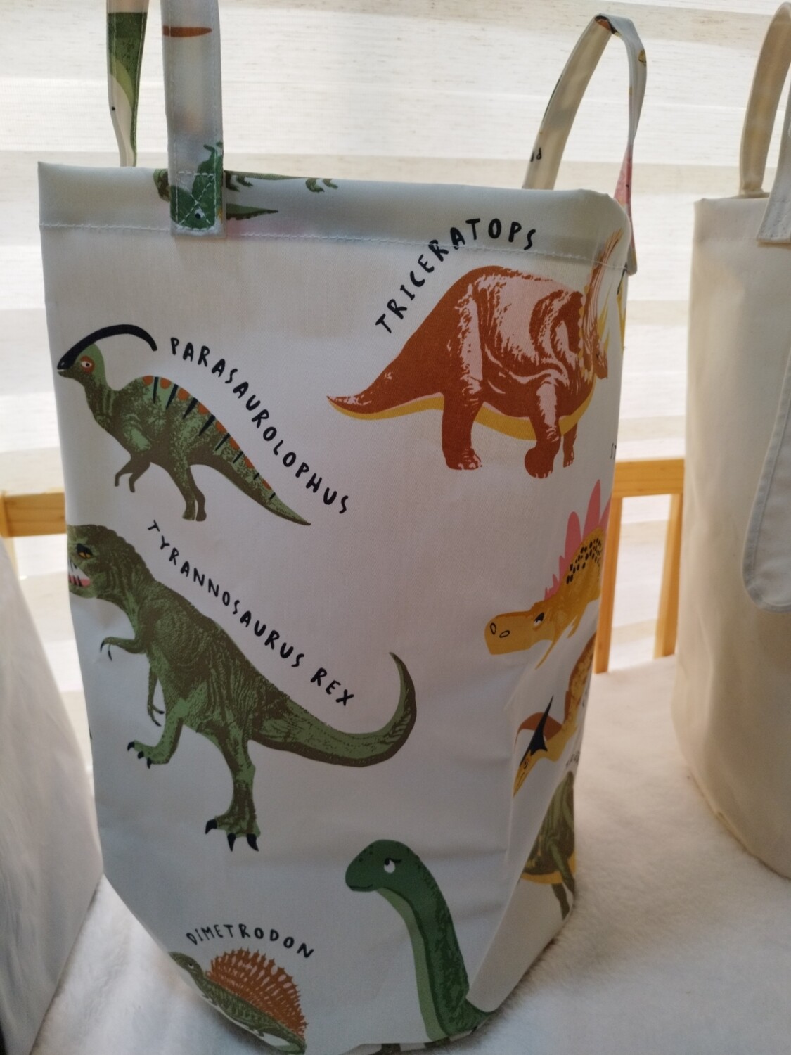 Cesto organizador de juguetes Dino
