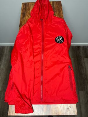 Red windbreaker Large