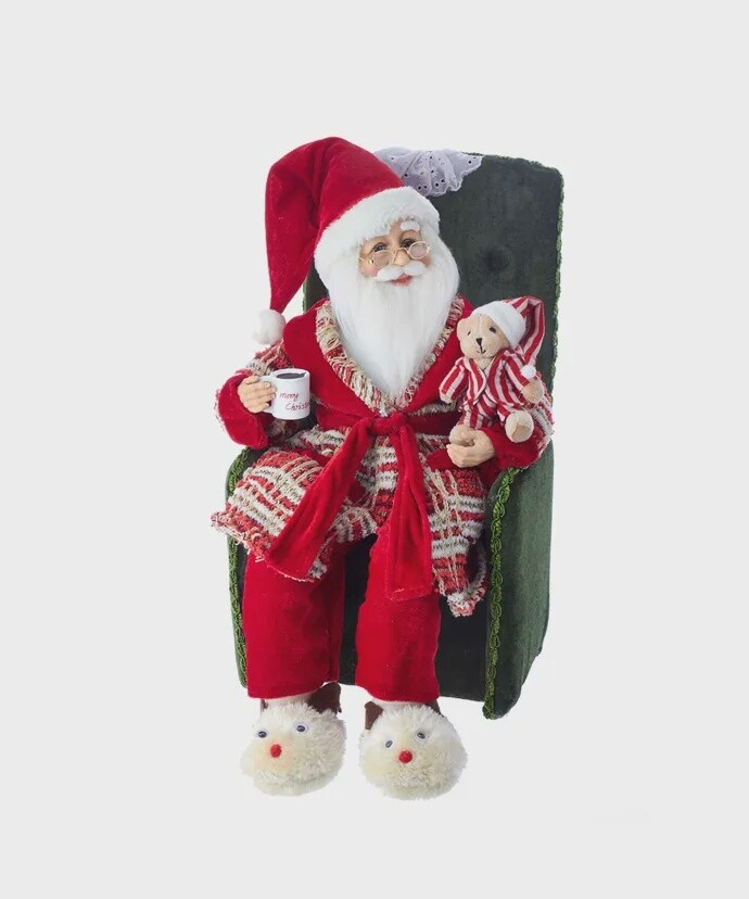 Santa in Pajamas Sitting in His Chair