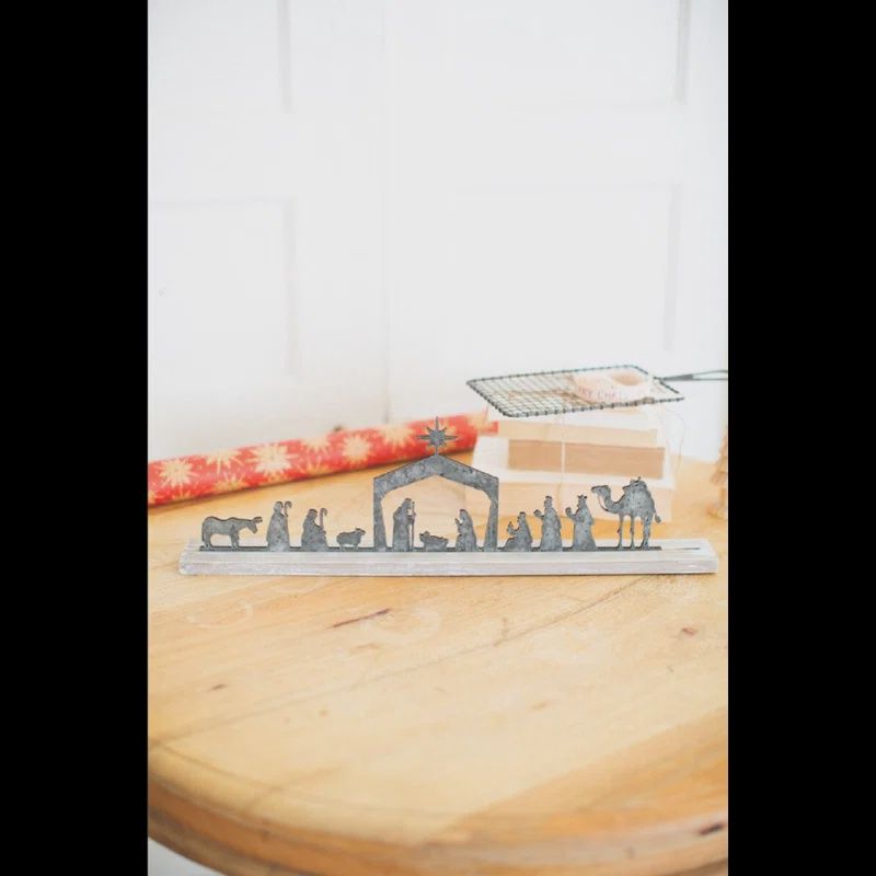 Metal Nativity on a Wooden Stand