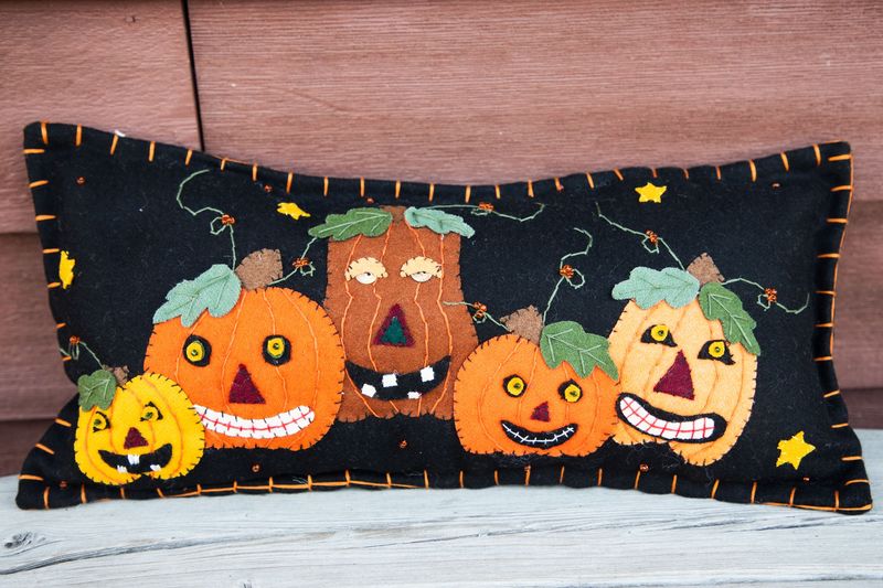 Five Happy Jack-O&#39;-Lanterns Felt Pillow