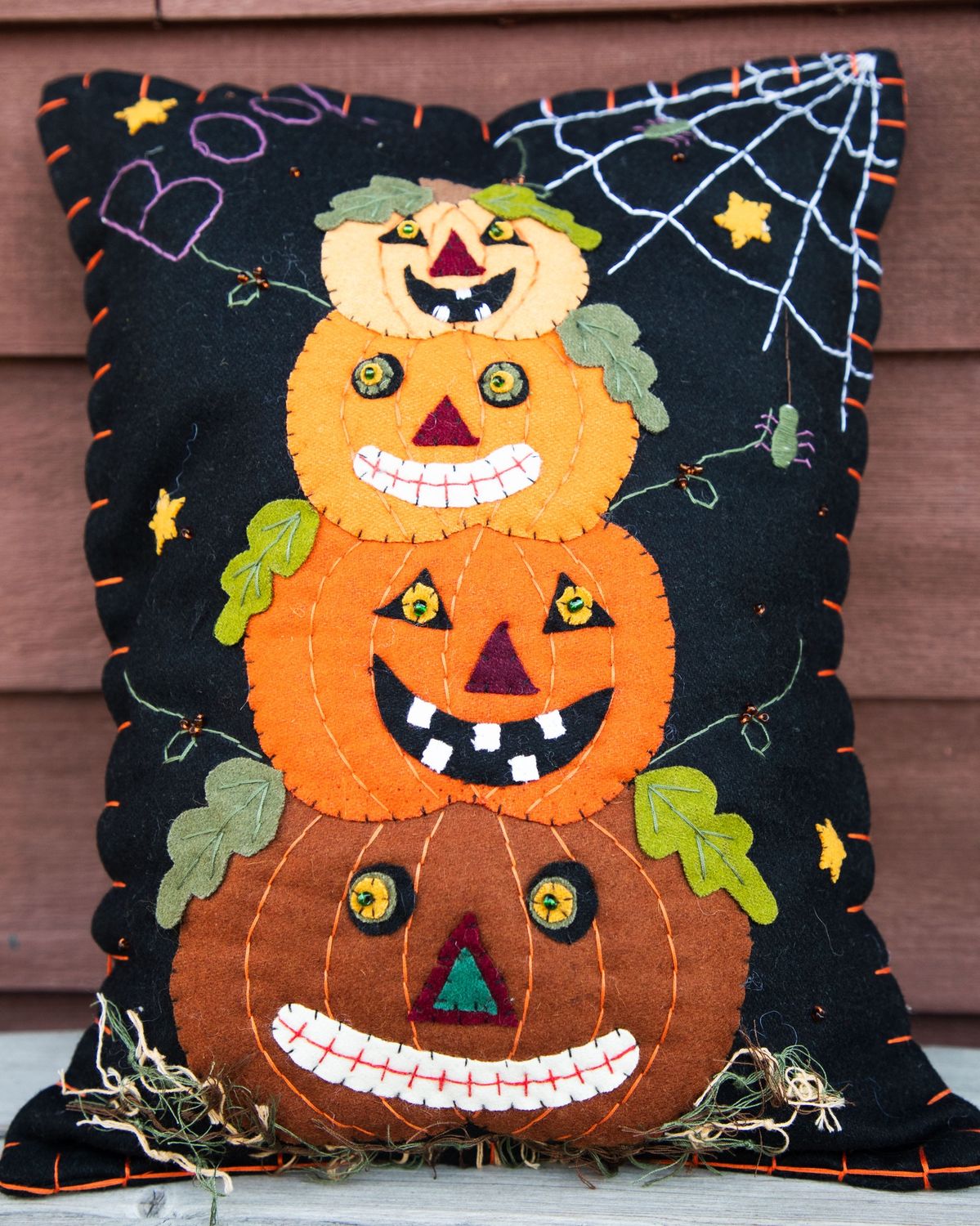 Four Stacked Jack-O&#39;-Lanterns Felt Pillow