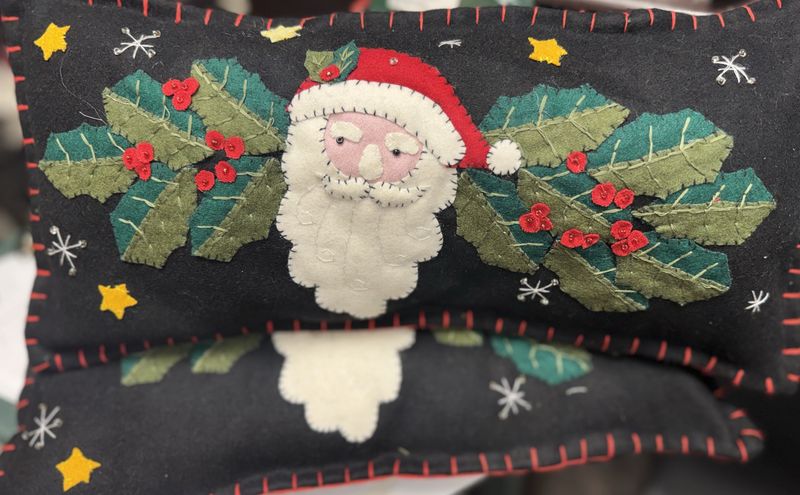 Santa with Holly on a Black Pillow