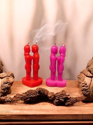 Couple Candle Face to Face