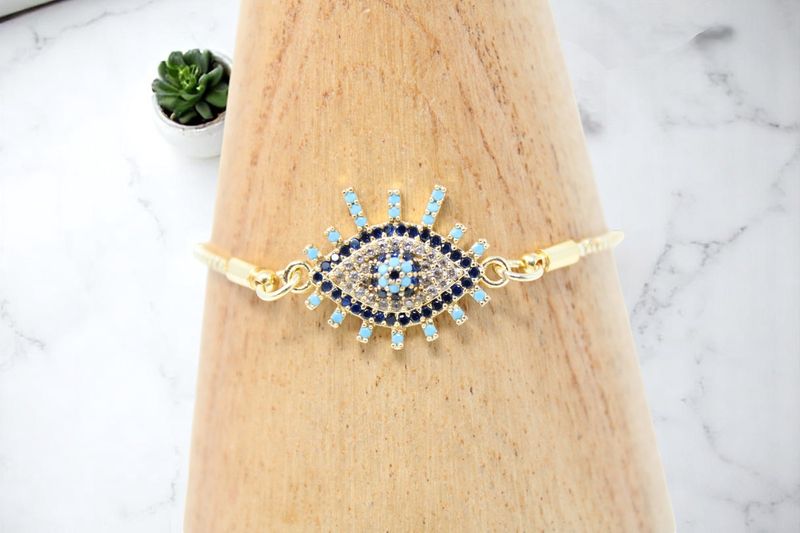 Gold Evil Eye Blue Lash Bracelet