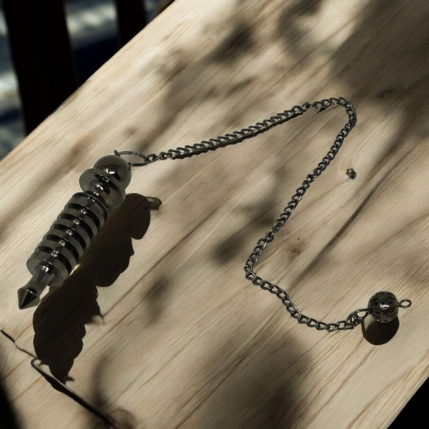 Chrome Isis Pendulum