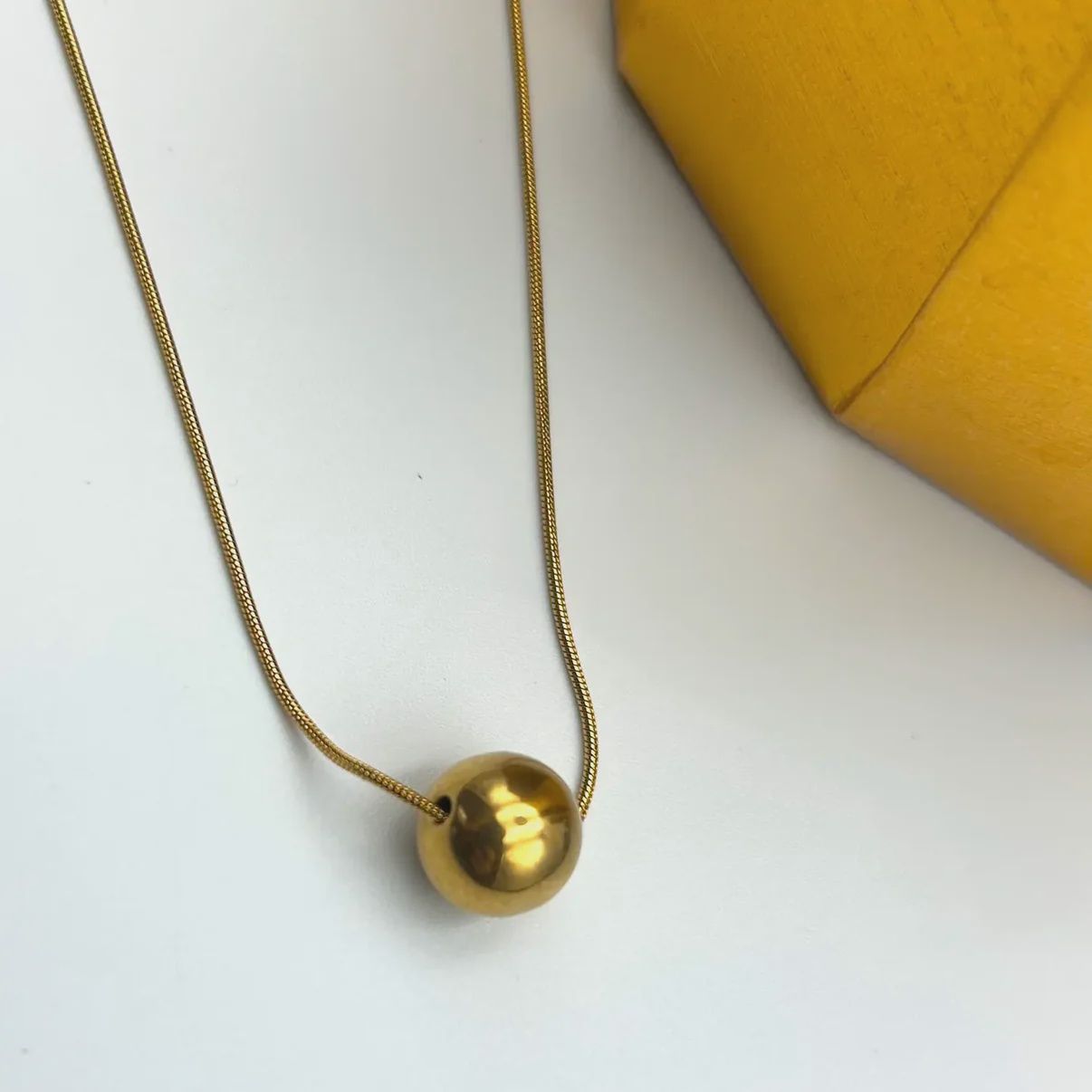 Gold Ball Pendant Necklace