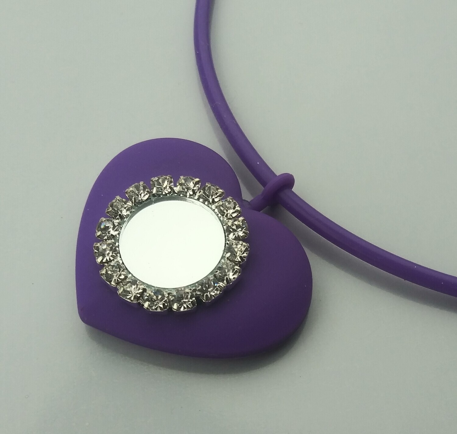 Purple heart with rhinestone center stretch rubber necklace