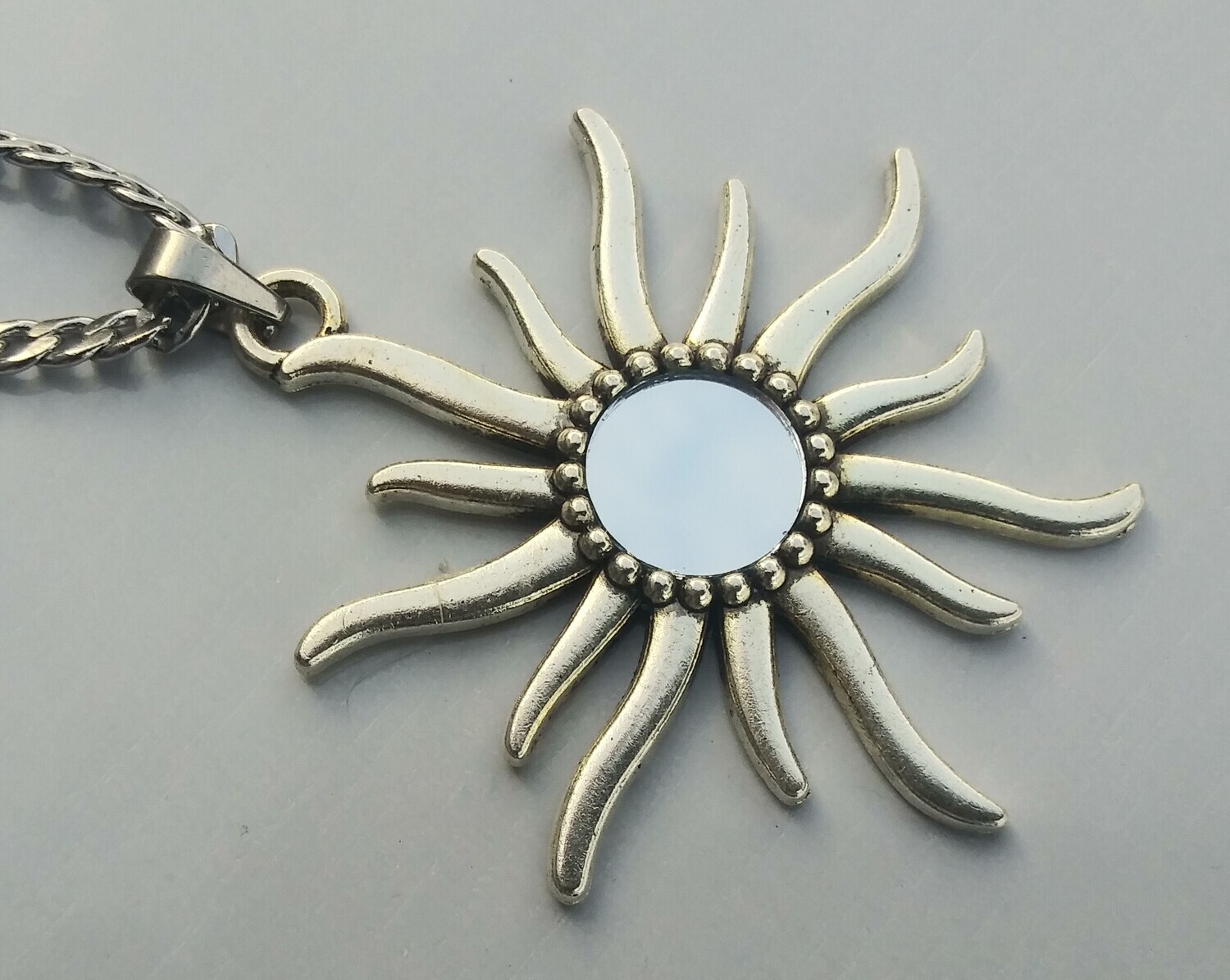 Alloy star on stainless steel chain