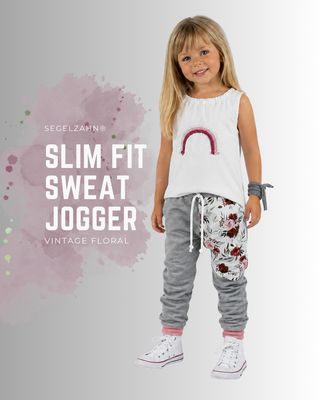 Sweathose Mädchen Blumen | Slim Fit Kinderhose Grau | Mitwachshose Floral | Handmade Jogger | Vintage Mädchenhosen Handgemachte Slim Fit Sweathose für Mädchen in Grau mit großer floraler Pfingstrosen-Seitentasche, rosa Bündchen