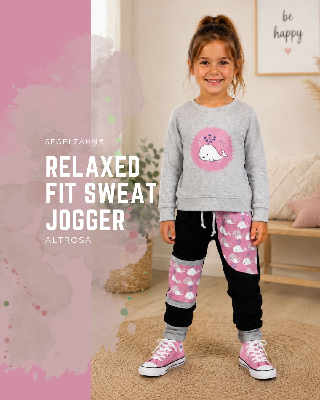 Mädchen Jogginghose in Altrosa und Schwarz mit süßem Walmotiv, bequeme Slim Fit Kinderhose aus Sweatstoff.