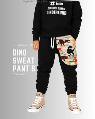 Dino Sweat Hose Kinder | schwarze Jogginghose Unise | Jungen Mädchen Sweathose Dinosaurier Slim Fit Sweat Hose Kinder, Unisex Jogginghose Schwarz mit cooler Dino Seitentasche, Dekobändern und Softbündchen in Schwarz