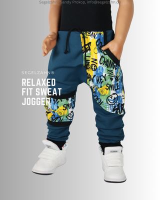 Kinderhose im Slim Fit Schnitt , gemütlich geschnitten aus Petrolfarbenem Sweatstoff, Jogginghose Unisex für Jungen und Mädch