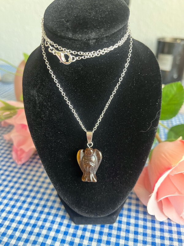 Pendentif Ange Œil du tigre
avec en une chaine en argent Pendentif Ange Œil du tigre
avec en une chaine en argent