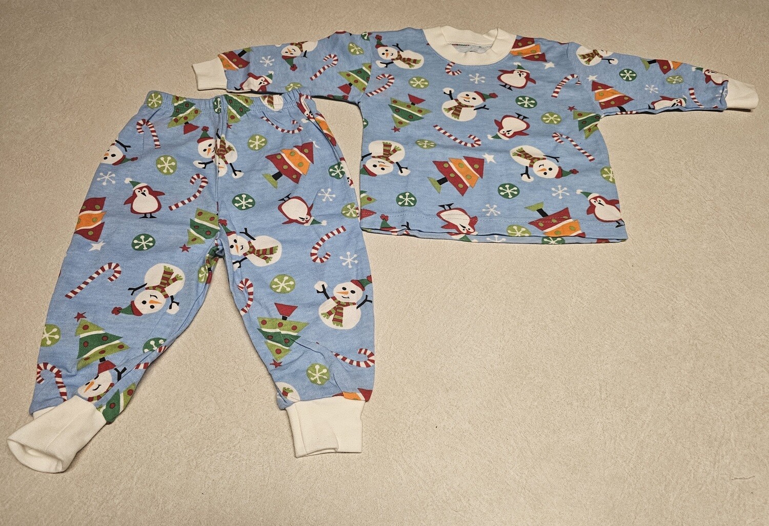 Unisex Long Sleeved Pajamas 
Light Blue Snowman