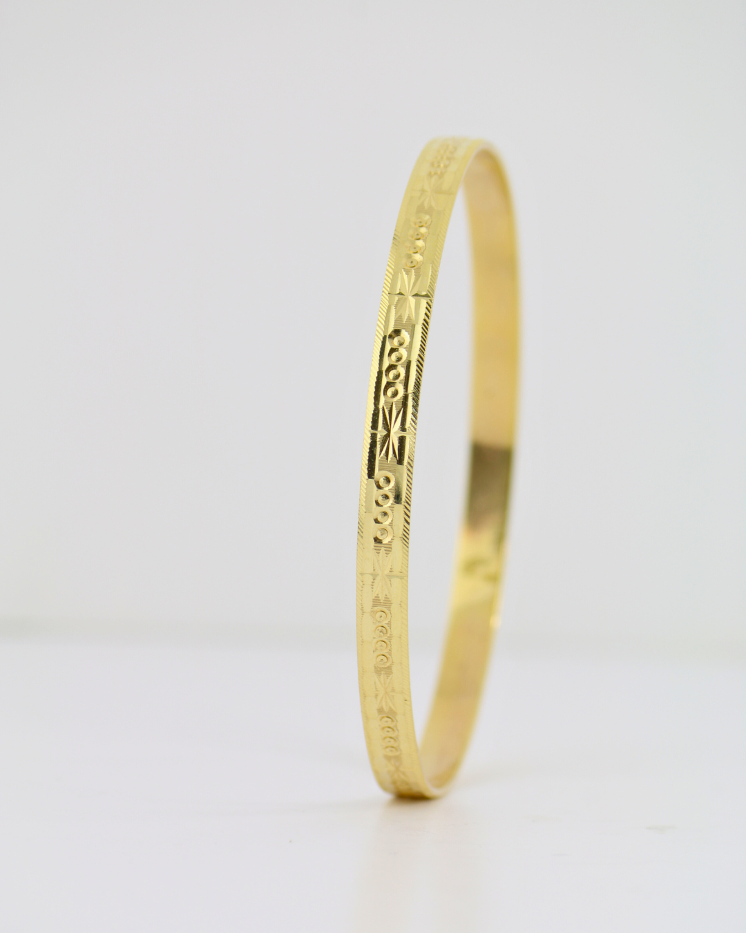 14kt Circles and Stars Bangle