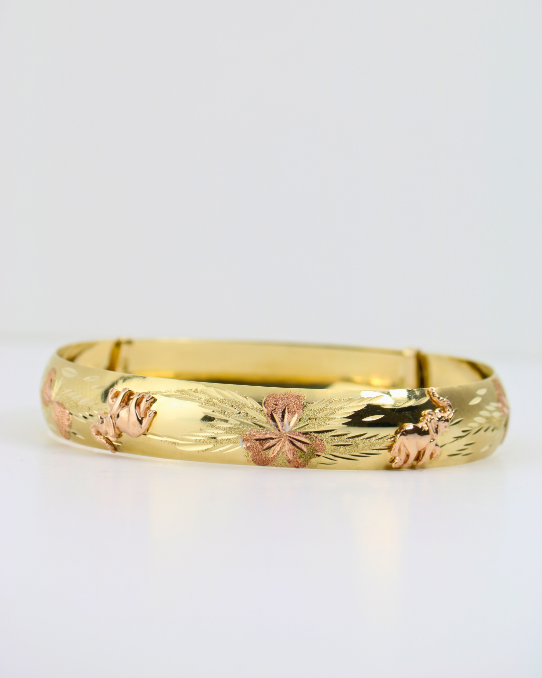 14kt Floral & Elephant Bangle 14kt Floral & Elephant Bangle