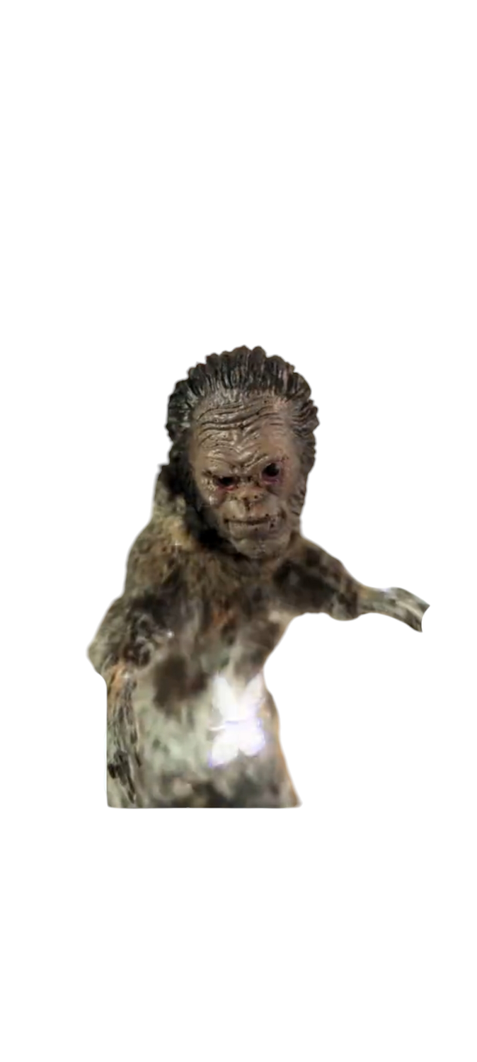 Bigfoot squirrel tabletop on driftwood.