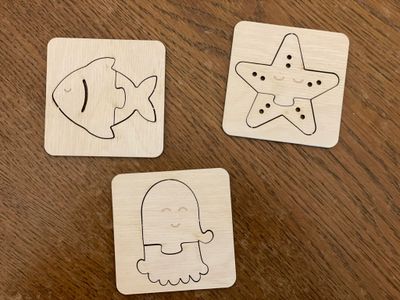 Wooden creatures puzzle from recuperated wood Wooden creatures puzzle from recuperated wood