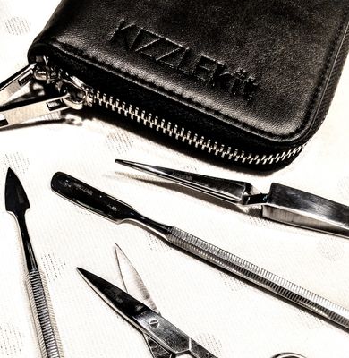 Zippie including Kizzmos - Clutch-sized case with set