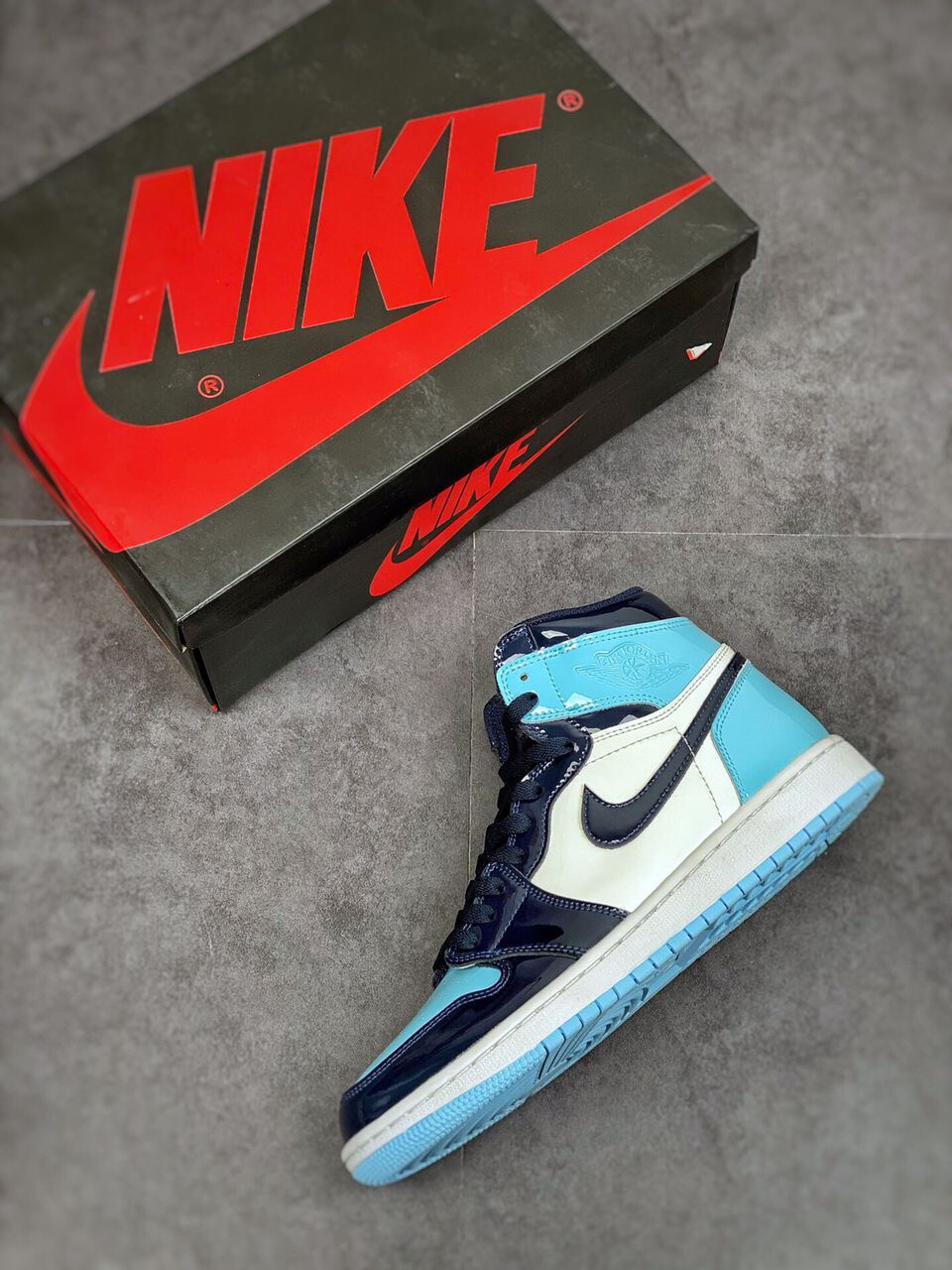 JORDAN 1 RETRO HIGH UNC OBSIDIAN PATENT