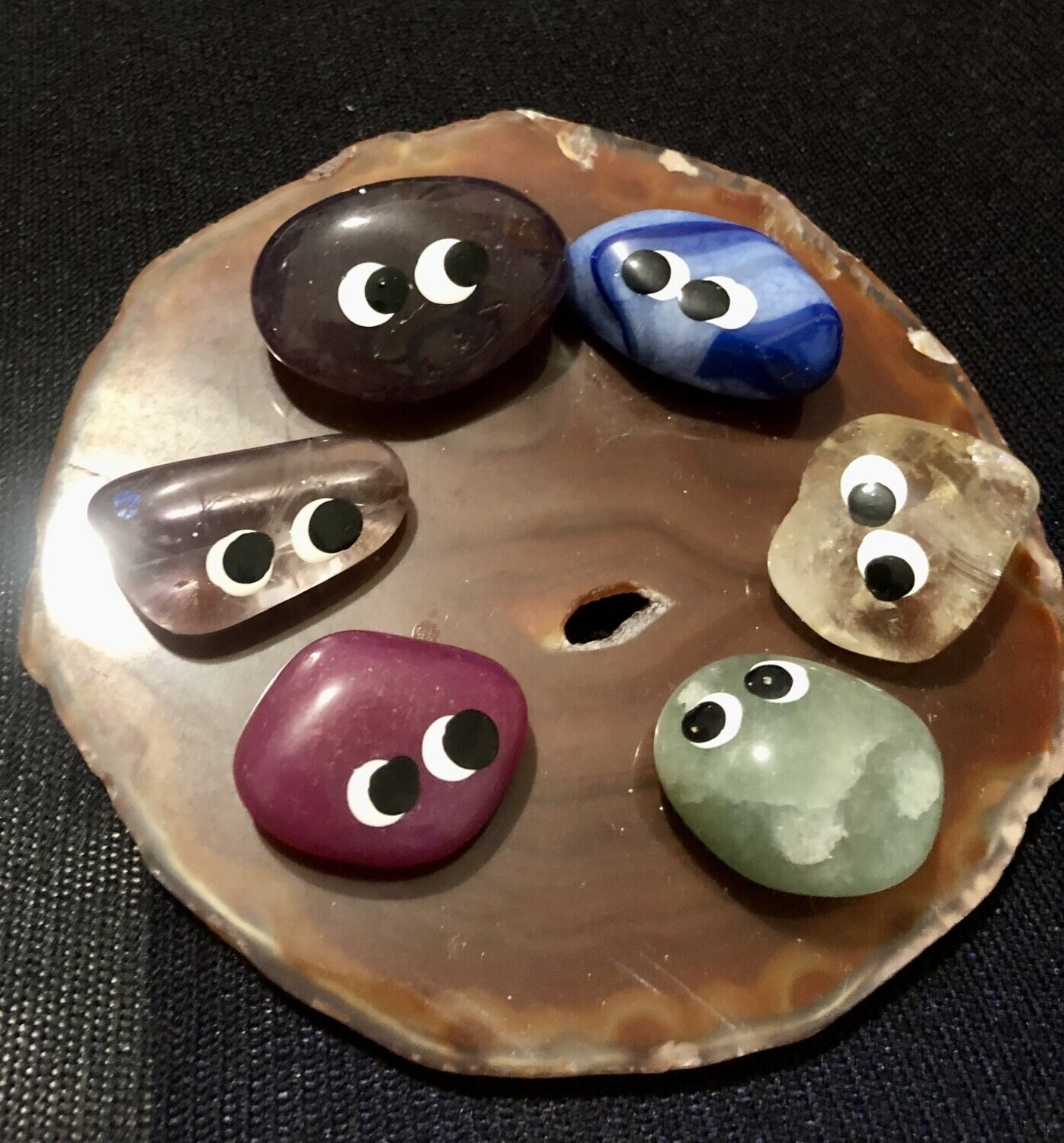 Crystals with 'bug eyes' on Agate slice