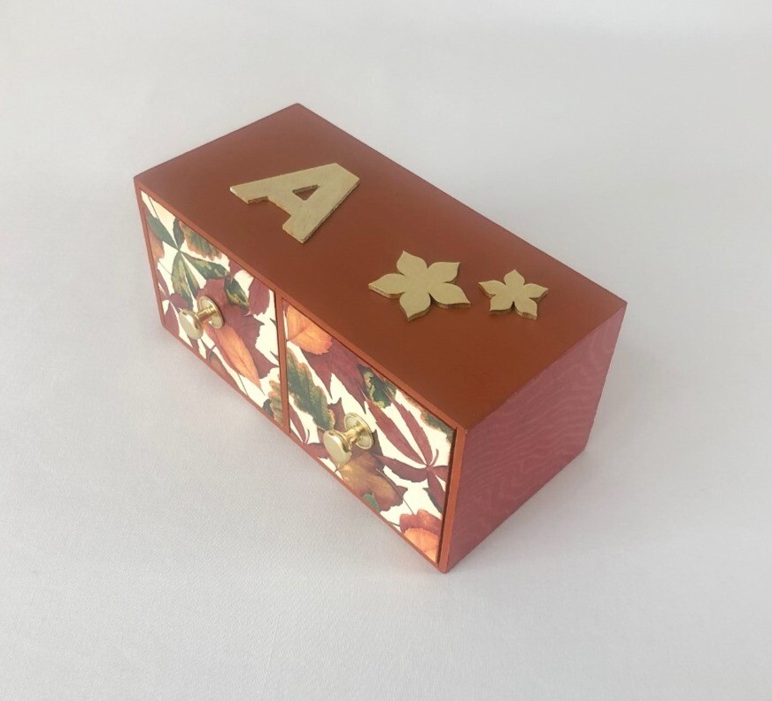 Cajonera doble terracota con hojas