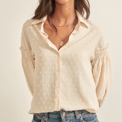 Top collared cream dot button front