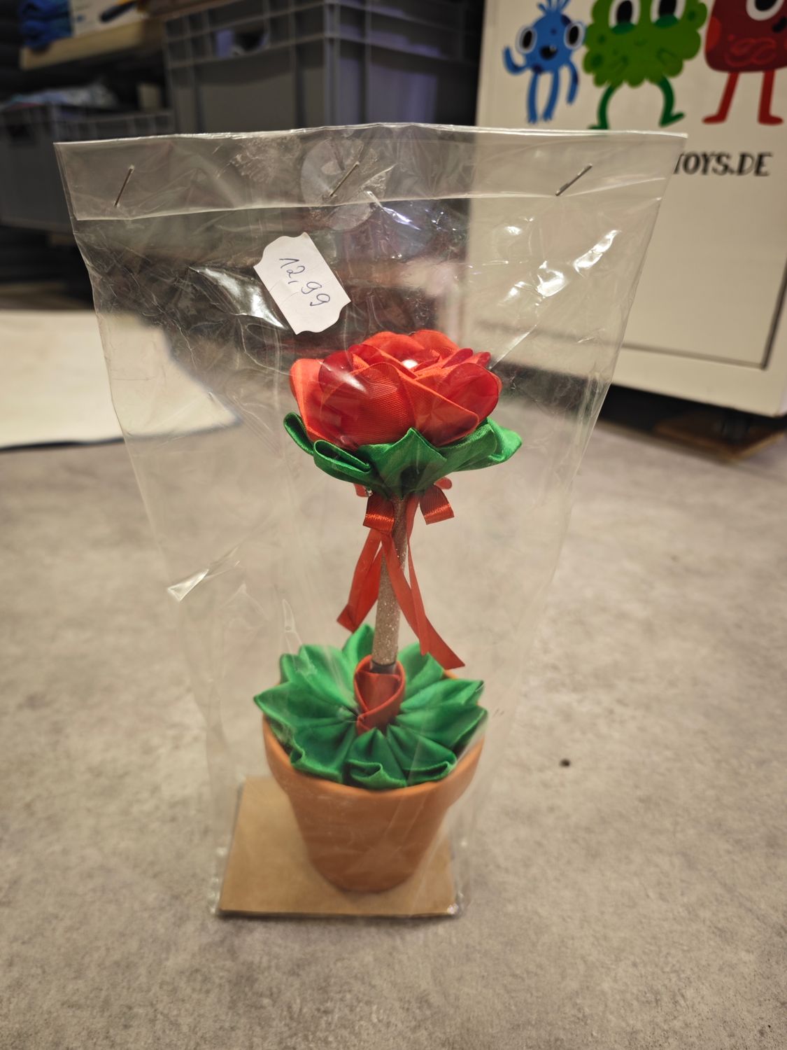 Rosenstifthalter in der Farbe rot orange