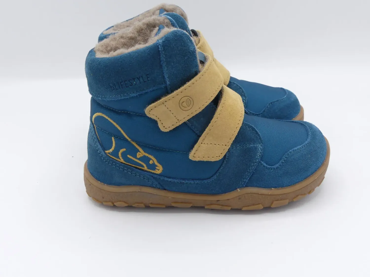 bLIFESTYLE eisbärSTYLE TEX Winter-Barfußstiefel in Petrol – Seitenansicht mit Klettverschlüssen