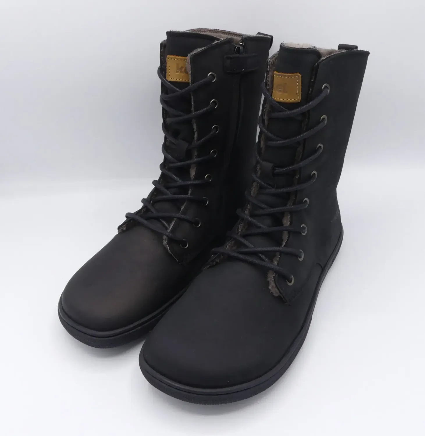 KOEL FARO Lambswool Barfuß-Boots Schwarz – Highcut Leder Winterstiefel KOEL Faro Schwarz Winter Barfußboots Damen aus Leder mit Lammwolle