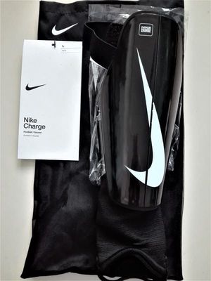 Parastinchi Nike Charge bambino - Nero