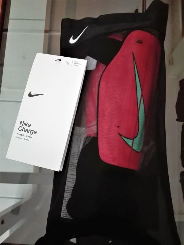 Parastinchi da calcio Nike Charge - Bambini Parastinchi Charge junior unisex arancio - Nike