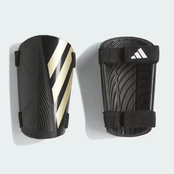 Parastinchi Adidas Tiro SG Training Parastinchi Tiro Training nero/oro - Adidas
