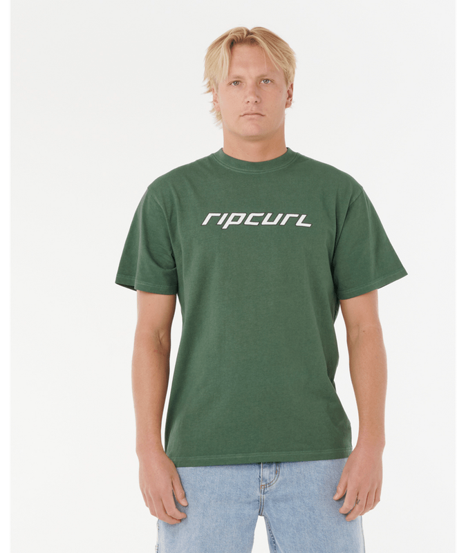 Model wearing the dark forest green RipCurl NU Dosed Tee, featuring a short sleeve relaxed fit and a distinctive white logo