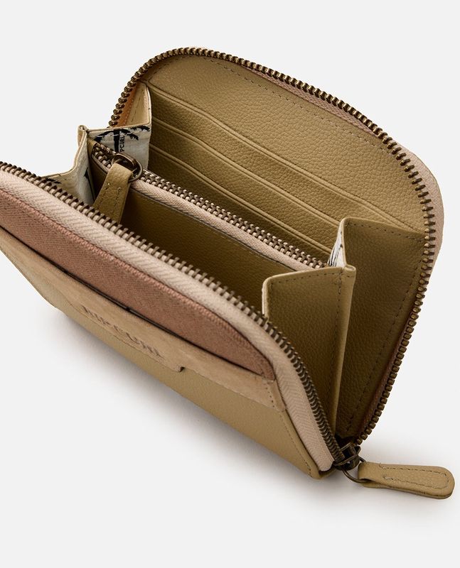 Interior view of the Ripcurl wallet revealing multiple card slots, cash compartments, and an inner zip pocket.