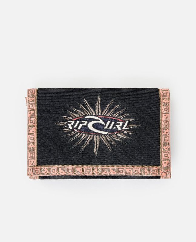 Black corduroy trifold wallet featuring a prominent embroidered RipCurl sunburst logo and unique pink tribal patterned edging