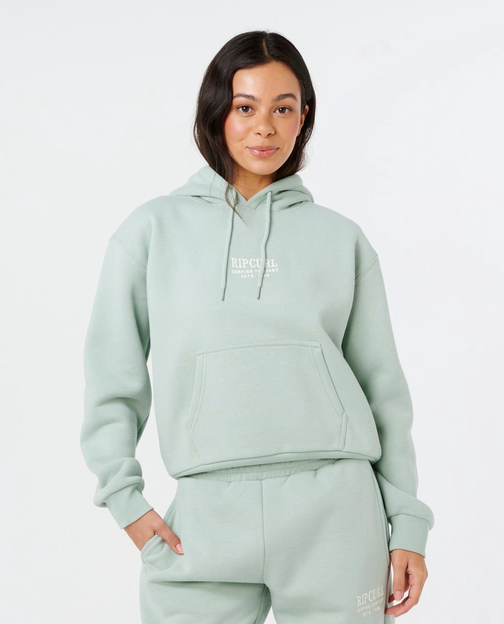 Women wearing Ripcurl surf staple hood in sage green 