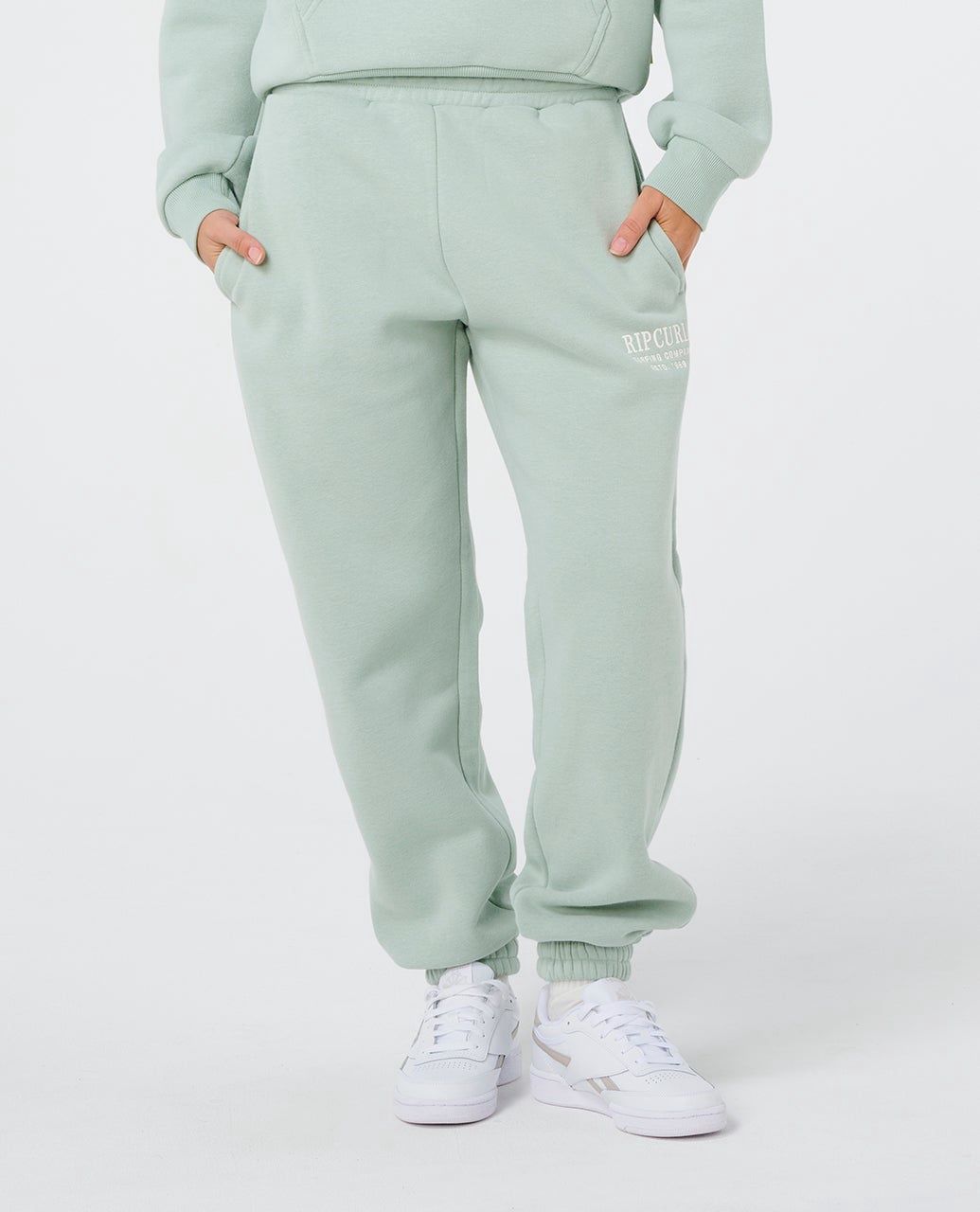 Ripcurl surf staple track pant in green with elastic cuff and waist band with drawstring 