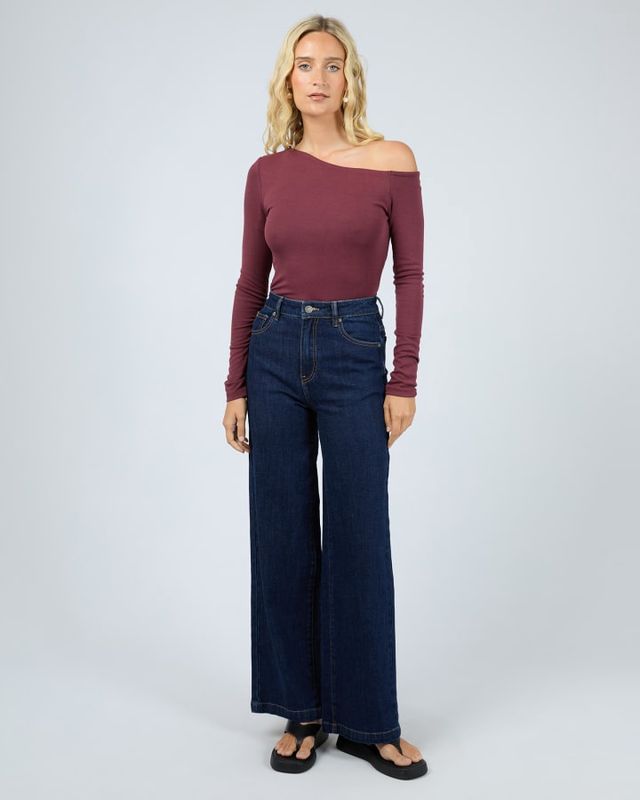 Women wearing the kylie long sleeve top in burgundy by all about eve
