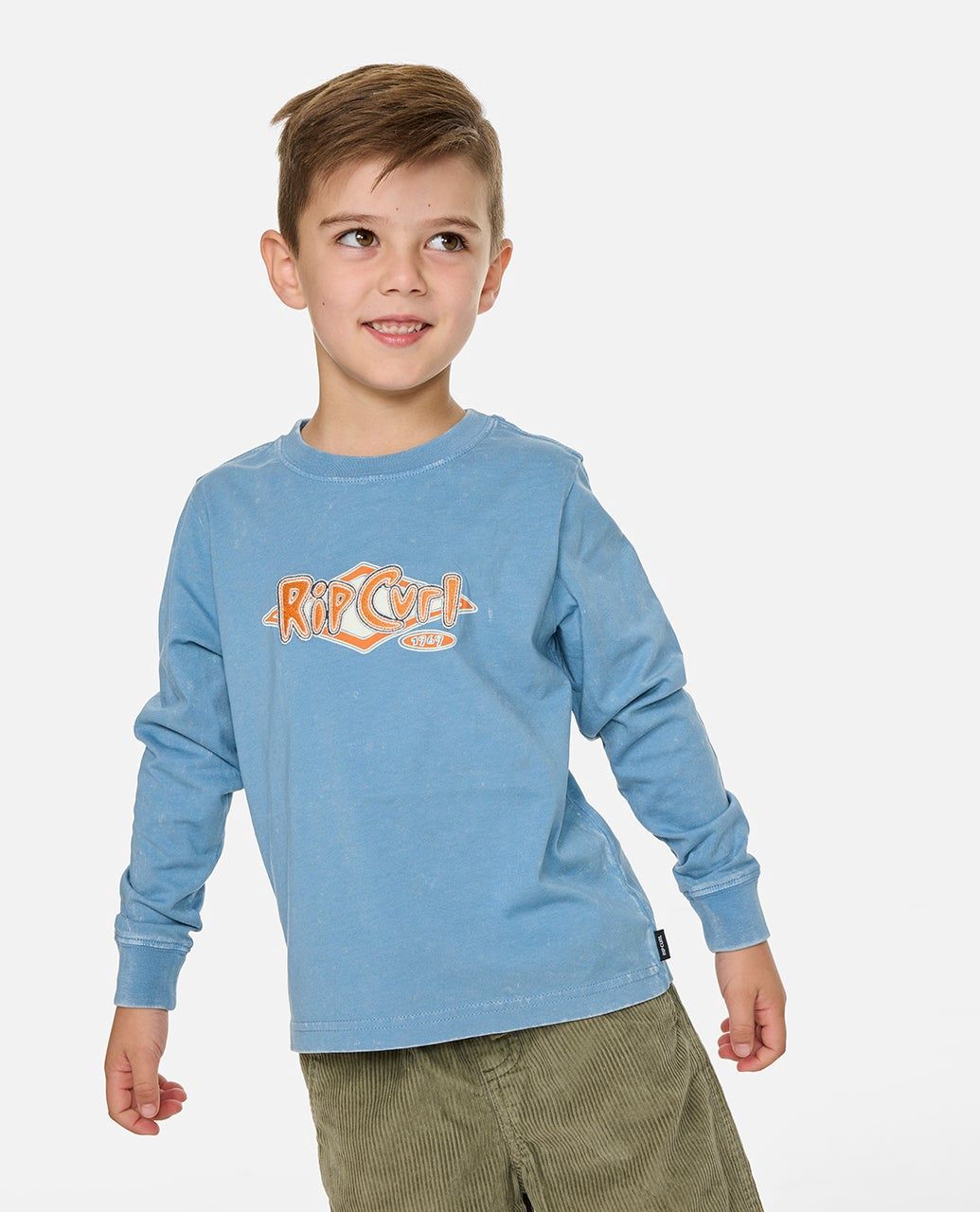 Toddler wearing the Ripcurl Ride the Wave Long Sleeve in faded denim blue with embroidered logo