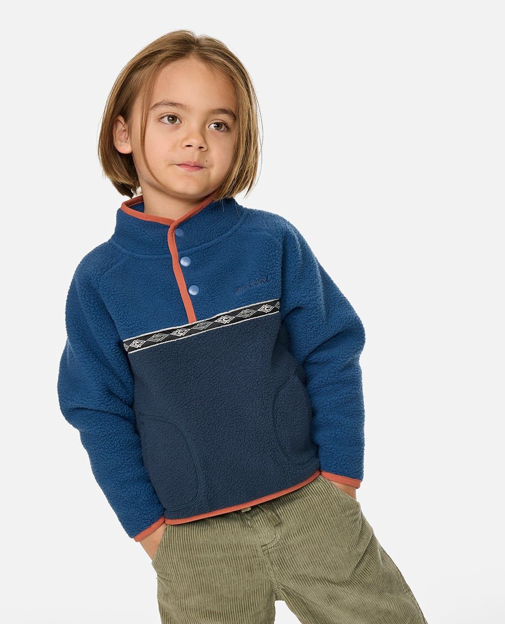 Toddler wearing the Heritage Polar Fleece By RipCurl featuring a soft polar fleece and ripcurl branding